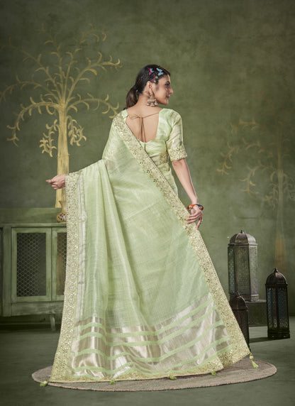 Pista Green Banarasi Linen Saree With Heavy Lace Work
