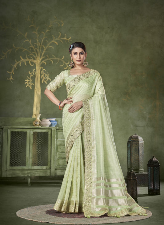 Pista Green Banarasi Linen Saree With Heavy Lace Work