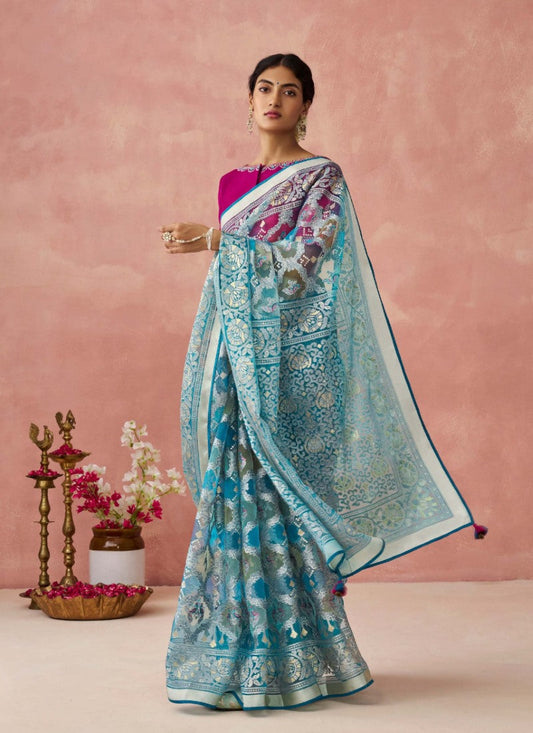 Blue Organza Saree With Print And Piping Work On Pallu