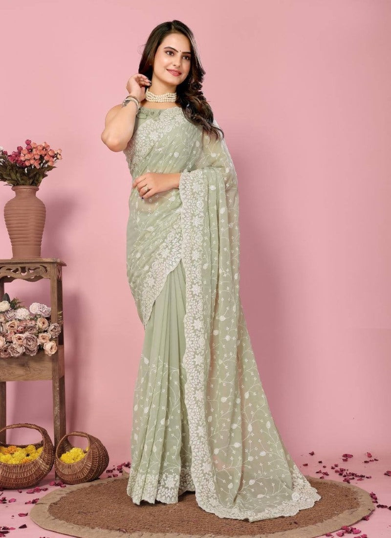 Pista  Georgette Heavy Border Saree