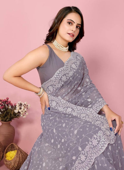 Lavender Georgette Heavy Border Saree