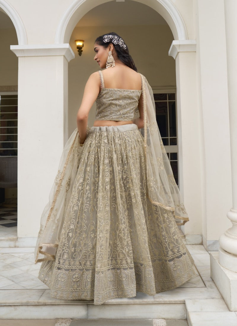 Beige Butterfly Net Lehenga Choli With Embroidered, Sequins and Thread Work