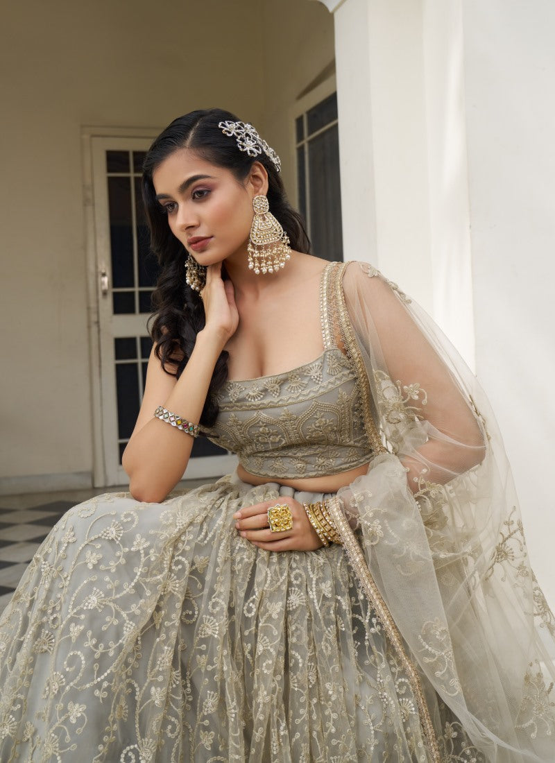 Beige Butterfly Net Lehenga Choli With Embroidered, Sequins and Thread Work