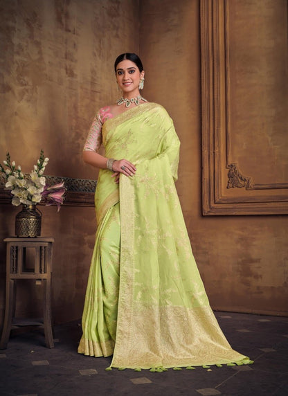 Pista Green Silk Saree With Heavy Embroidered Blouse