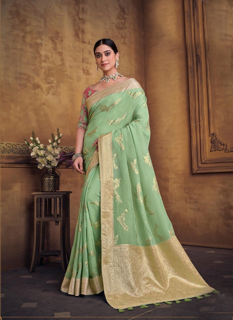 Green Silk Saree With Heavy Embroidered Blouse